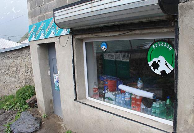 Gergeti village with its neat rows of shops